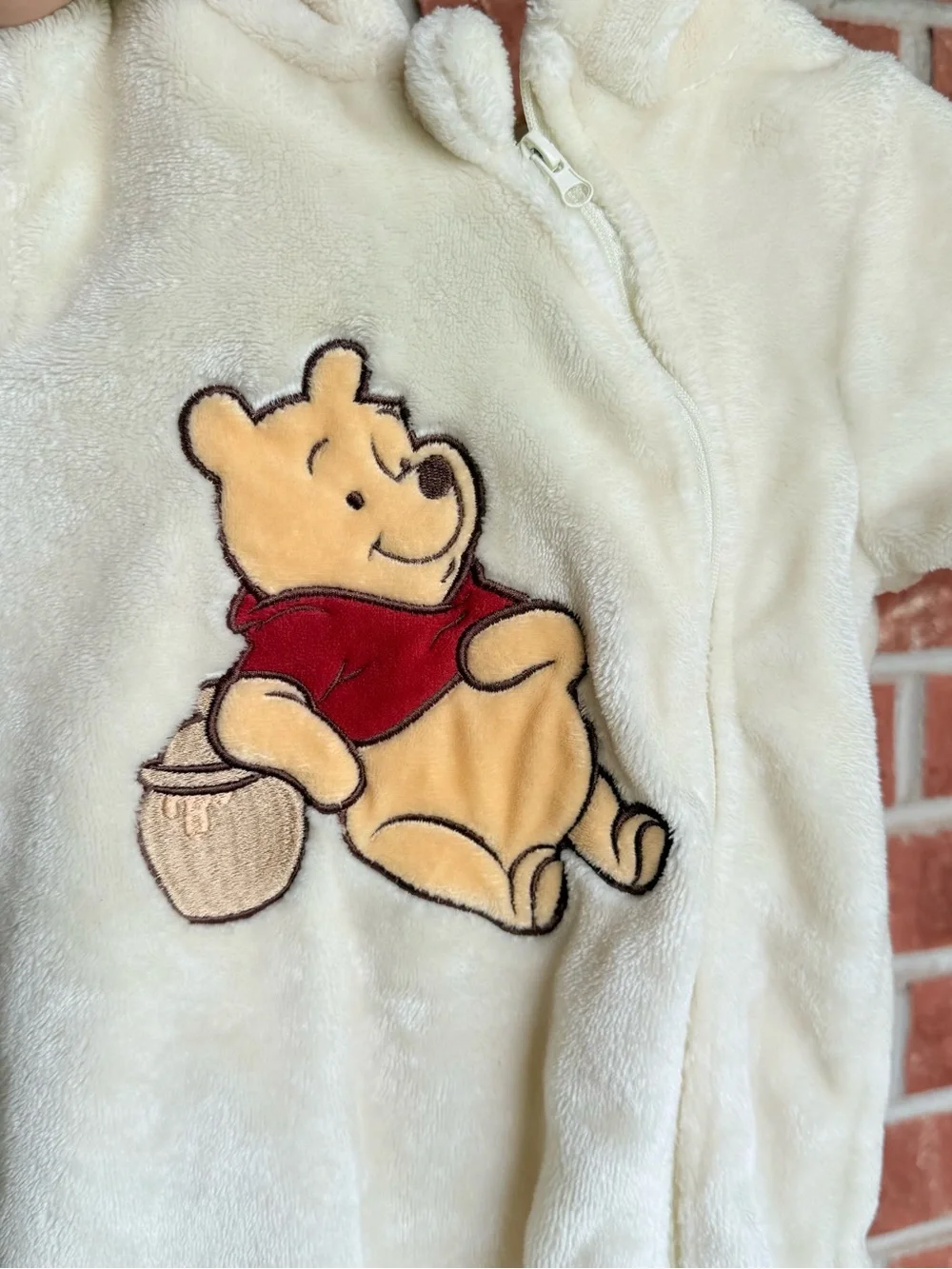 Disney Cream Winnie the Pooh Plush Footed One-Piece